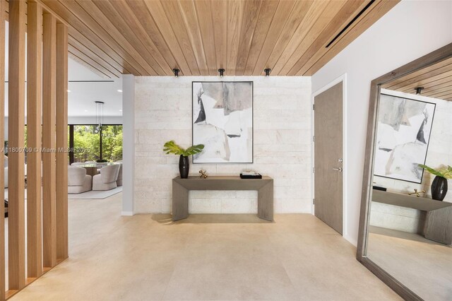 2905 Washington St, Miami, FL 33133 - corridor with concrete flooring and wood ceiling