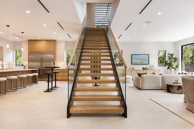 2905 Washington St, Miami, FL 33133 - staircase featuring recessed lighting