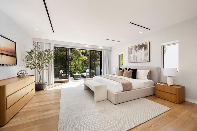2905 Washington St, Miami, FL 33133 - bedroom with access to outside and light wood-style flooring