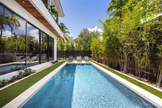 2905 Washington St, Miami, FL 33133 - view of pool with a fenced backyard and a patio area