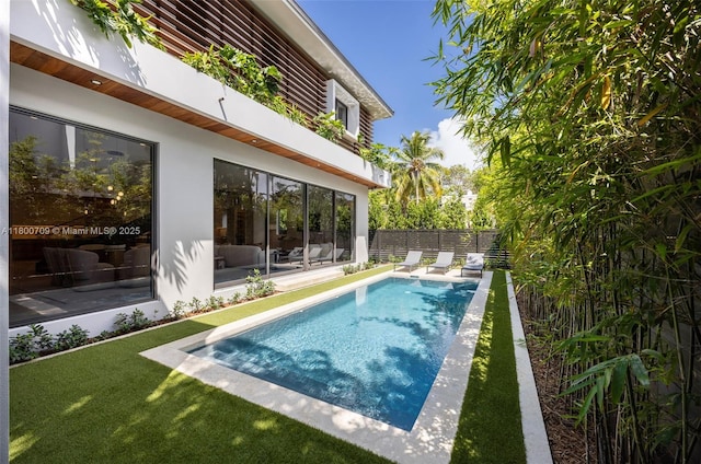 2905 Washington St, Miami, FL 33133 - view of swimming pool featuring a fenced backyard