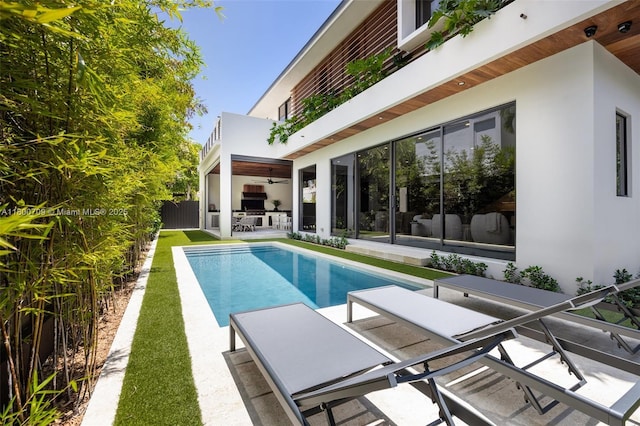 2905 Washington St, Miami, FL 33133 - swimming pool with a ceiling fan, a patio area, and fence