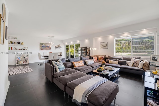 1700 NE 105th St Unit 108, Miami Shores, FL 33138 - living area featuring a chandelier