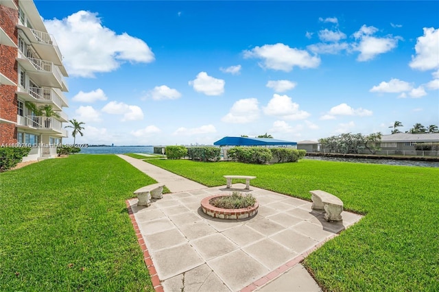 1700 NE 105th St Unit 108, Miami Shores, FL 33138 - view of green lawn with a patio