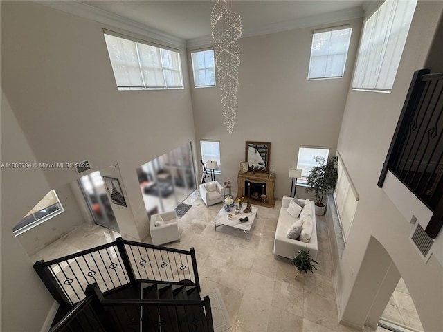 8389 NW 115th Ct, Doral, FL 33178 - living area with ornamental molding and a high ceiling