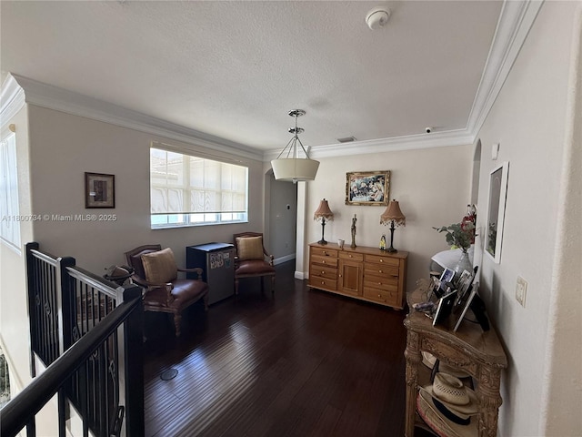8389 NW 115th Ct, Doral, FL 33178 - living area featuring ornamental molding, dark wood-type flooring, an upstairs landing, and a textured ceiling