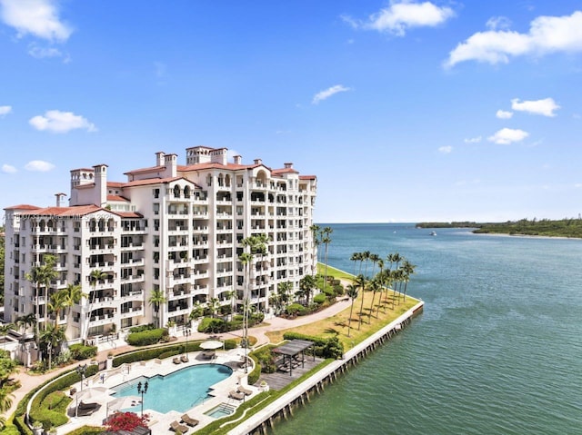 5266 Fisher Island Dr Unit 5266, Miami Beach, FL 33109 - drone / aerial view of a nearby body of water, apartment complex / building, and a pool