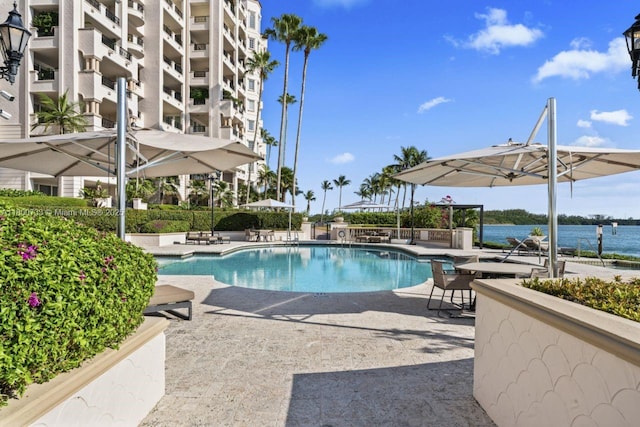 5266 Fisher Island Dr Unit 5266, Miami Beach, FL 33109 - community pool featuring a patio and a water view