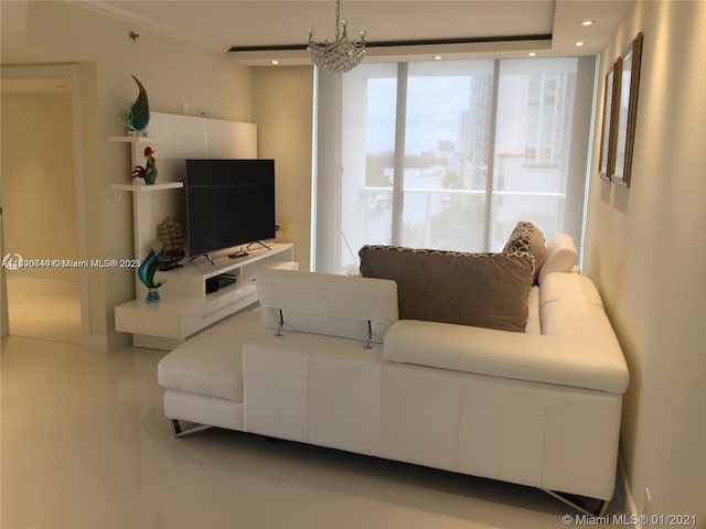 16485 Collins Ave Unit 538, Sunny Isles Beach, FL 33160 - living area with a chandelier, recessed lighting, and ornamental molding