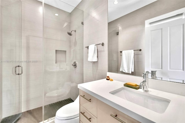 164 W Mashta Dr, Key Biscayne, FL 33149 - full bath featuring toilet, vanity, a shower stall, and recessed lighting