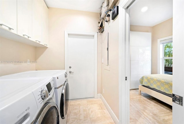 164 W Mashta Dr, Key Biscayne, FL 33149 - laundry room featuring washer and dryer, cabinet space, and baseboards