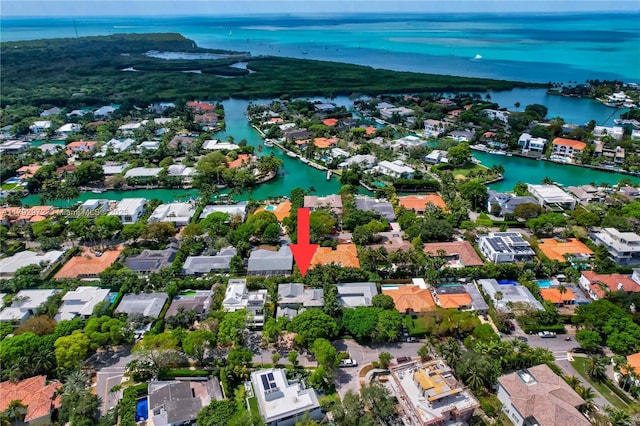 164 W Mashta Dr, Key Biscayne, FL 33149 - aerial view of property and surrounding area with nearby suburban area and a large body of water