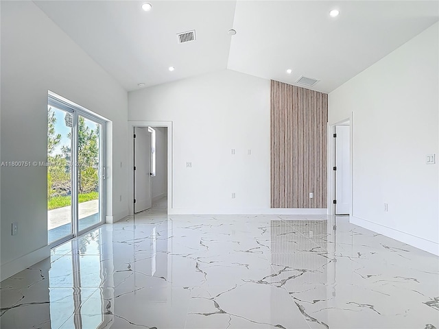 unfurnished room featuring light marble finish flooring, recessed lighting, high vaulted ceiling, and baseboards