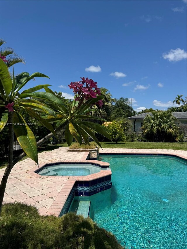 1234 NE 96th St, Miami Shores, FL 33138 - view of pool featuring a pool with connected hot tub