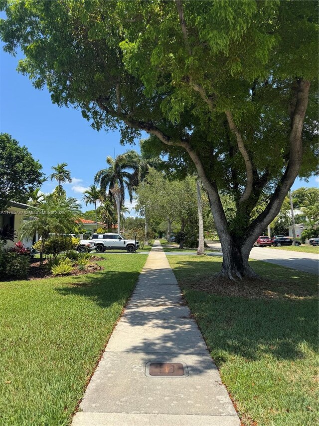 1234 NE 96th St, Miami Shores, FL 33138 - view of front of house featuring a front yard