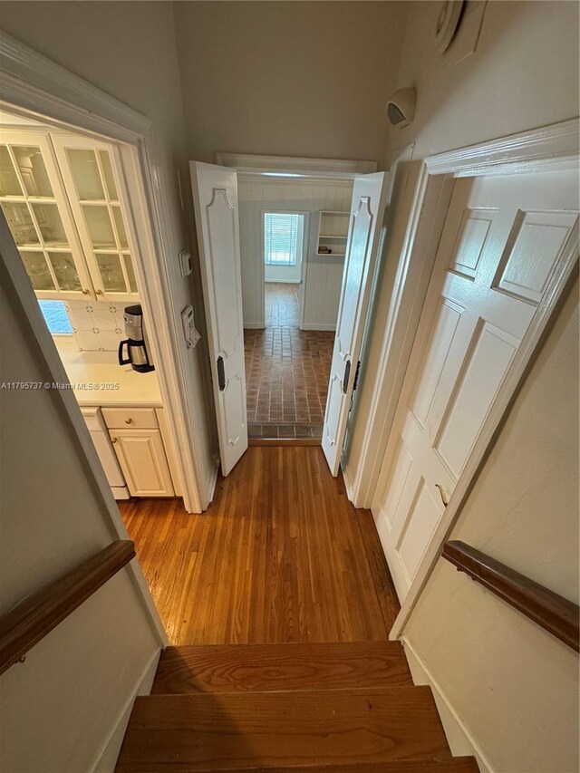 1234 NE 96th St, Miami Shores, FL 33138 - corridor with dark wood-style floors