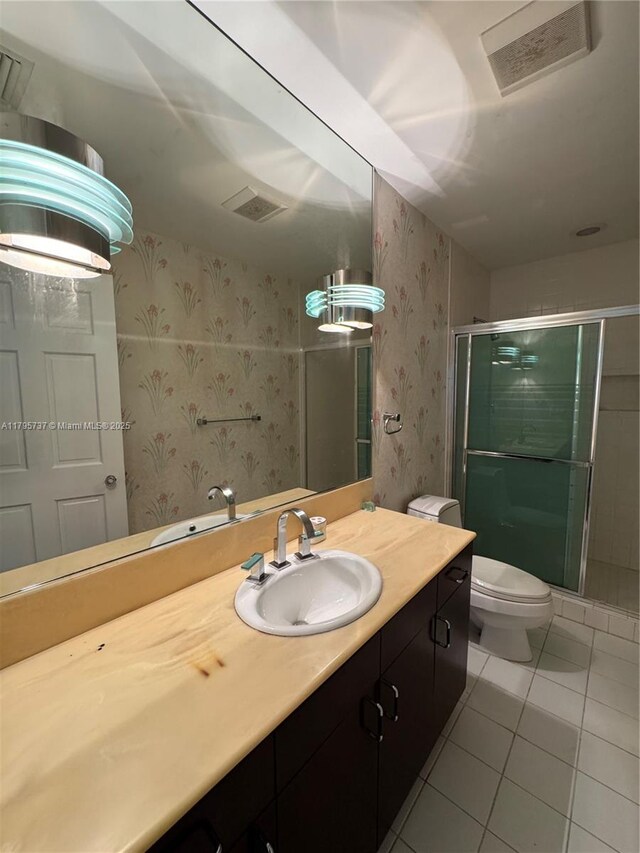 1234 NE 96th St, Miami Shores, FL 33138 - full bath featuring wallpapered walls, tile patterned flooring, a shower stall, vanity, and toilet
