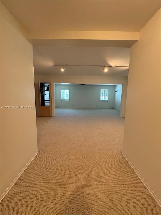 1234 NE 96th St, Miami Shores, FL 33138 - hall with carpet, baseboards, and track lighting