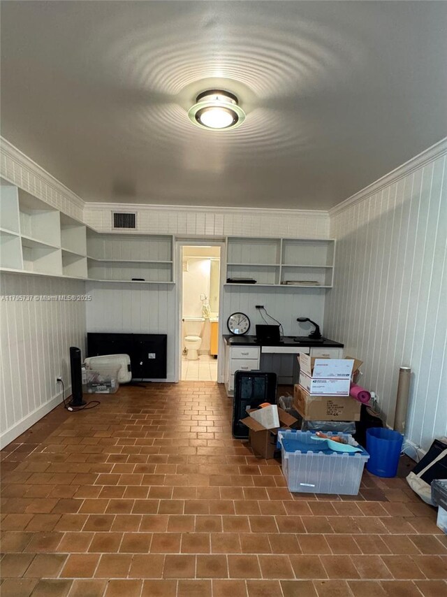 1234 NE 96th St, Miami Shores, FL 33138 - living area featuring wooden walls and ornamental molding