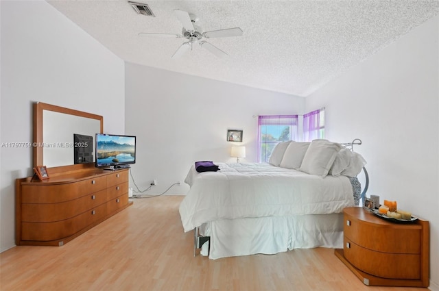 18417 NW 9th Ct, Pembroke Pines, FL 33029 - bedroom featuring a textured ceiling, lofted ceiling, wood finished floors, and a ceiling fan