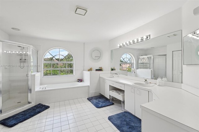 18417 NW 9th Ct, Pembroke Pines, FL 33029 - bathroom featuring a stall shower, a garden tub, double vanity, and tile patterned floors