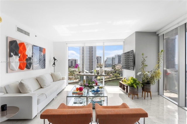 495 Brickell Ave Unit 1001, Miami, FL 33131 - living area featuring a wall of windows, a view of city, and marble tiled flooring