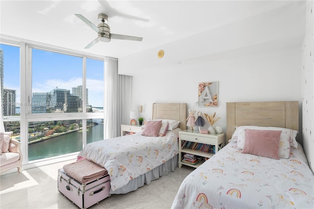 495 Brickell Ave Unit 1001, Miami, FL 33131 - bedroom featuring a city view, a water view, access to exterior, a ceiling fan, and floor to ceiling windows