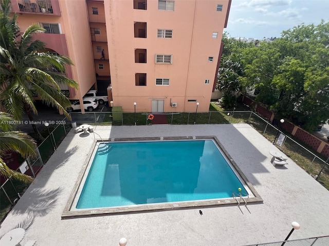 community pool with fence