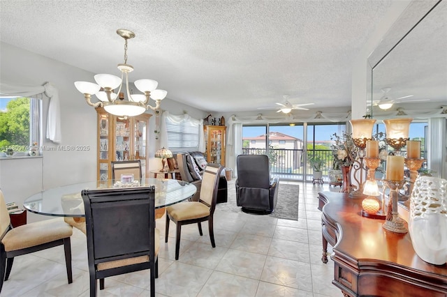 1500 SW 131st Way Unit 401N, Pembroke Pines, FL 33027 - dining room with a ceiling fan, plenty of natural light, a chandelier, a textured ceiling, and light tile patterned flooring