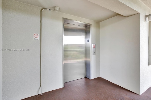 view of exterior entry with elevator