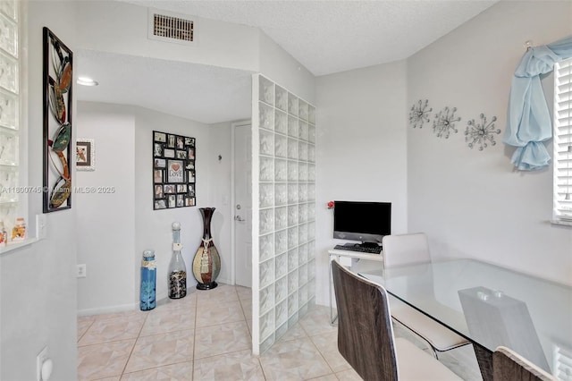 1500 SW 131st Way Unit 401N, Pembroke Pines, FL 33027 - office area featuring a textured ceiling and light tile patterned floors