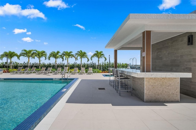 community pool featuring a patio