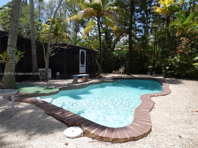 outdoor pool featuring a patio