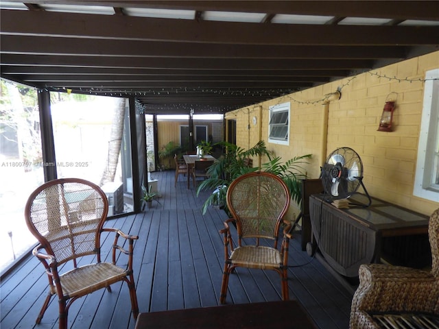 wooden deck with outdoor dining space