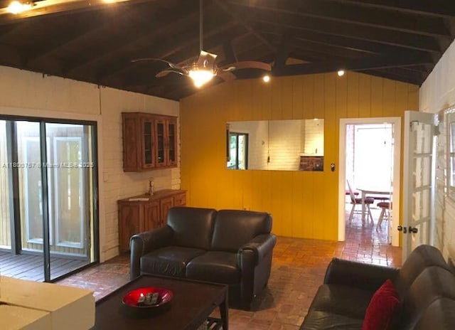 living area with wood walls