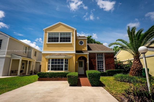 12840 SW 146th Ln, Miami, FL 33186 - traditional-style house featuring roof with shingles and brick siding