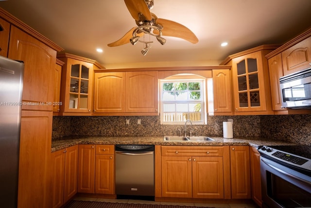 12840 SW 146th Ln, Miami, FL 33186 - kitchen with appliances with stainless steel finishes, a sink, a ceiling fan, glass insert cabinets, and recessed lighting
