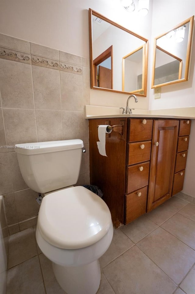 12840 SW 146th Ln, Miami, FL 33186 - bathroom with tile patterned floors, vanity, toilet, and tile walls