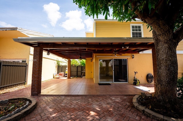 12840 SW 146th Ln, Miami, FL 33186 - view of patio featuring ceiling fan and fence