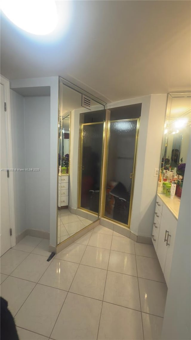 1351 NE Miami Gardens Dr Unit 1225E, Miami, FL 33179 - bathroom featuring vanity, tile patterned floors, and a shower stall