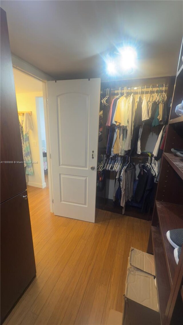 1351 NE Miami Gardens Dr Unit 1225E, Miami, FL 33179 - spacious closet featuring light wood-style floors