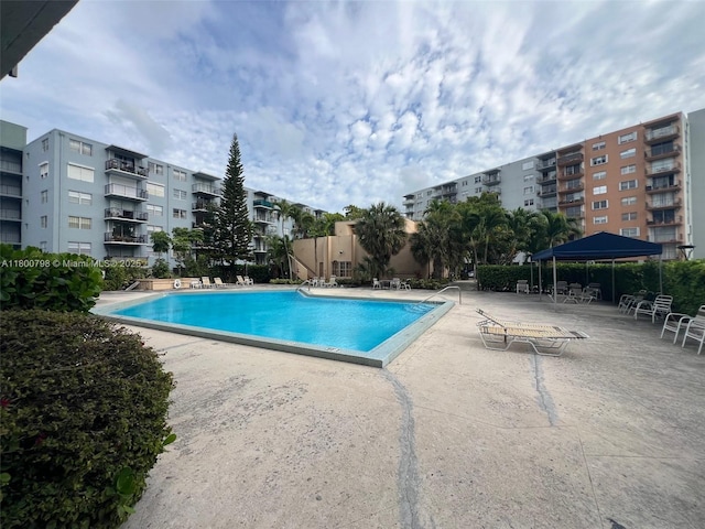 1470 NE 125th Ter Unit 810, North Miami, FL 33161 - community pool featuring a patio area