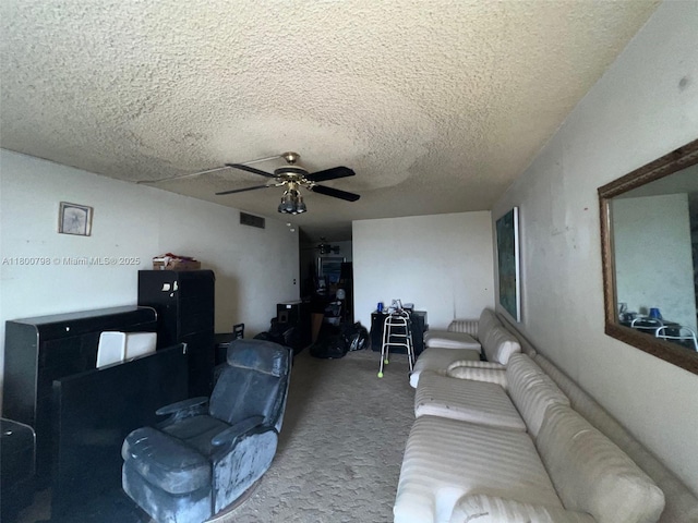 1470 NE 125th Ter Unit 810, North Miami, FL 33161 - carpeted living area featuring a ceiling fan and a textured ceiling