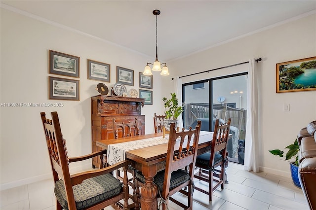 15073 SW 119th Ln, Miami, FL 33196 - dining room featuring baseboards and crown molding