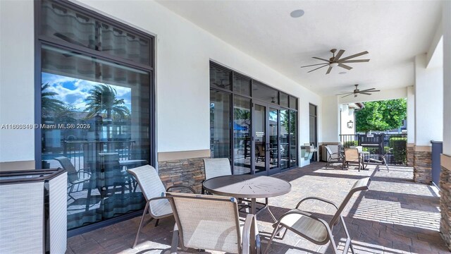 15073 SW 119th Ln, Miami, FL 33196 - view of patio / terrace featuring ceiling fan and outdoor dining area