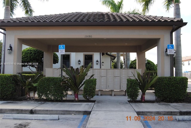 15073 SW 119th Ln, Miami, FL 33196 - view of front of home with a tiled roof and stucco siding