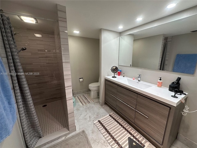 1865 S Ocean Dr Unit 17C, Hallandale Beach, FL 33009 - full bath with a tile shower, toilet, vanity, recessed lighting, and baseboards