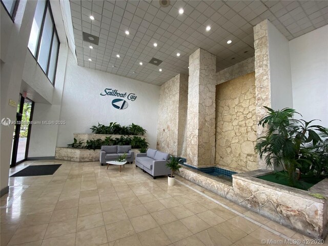 13499 Biscayne Blvd Unit 713, North Miami, FL 33181 - lobby featuring a high ceiling and recessed lighting