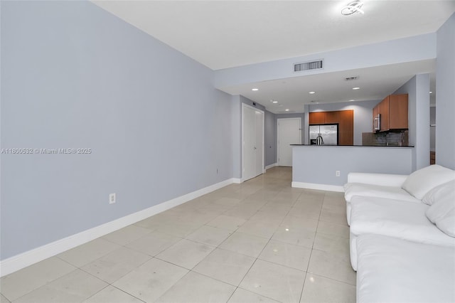 1060 Brickell Ave Unit 1811, Miami, FL 33131 - living area featuring light tile patterned floors and baseboards