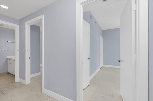 1060 Brickell Ave Unit 1811, Miami, FL 33131 - corridor with baseboards and light tile patterned flooring